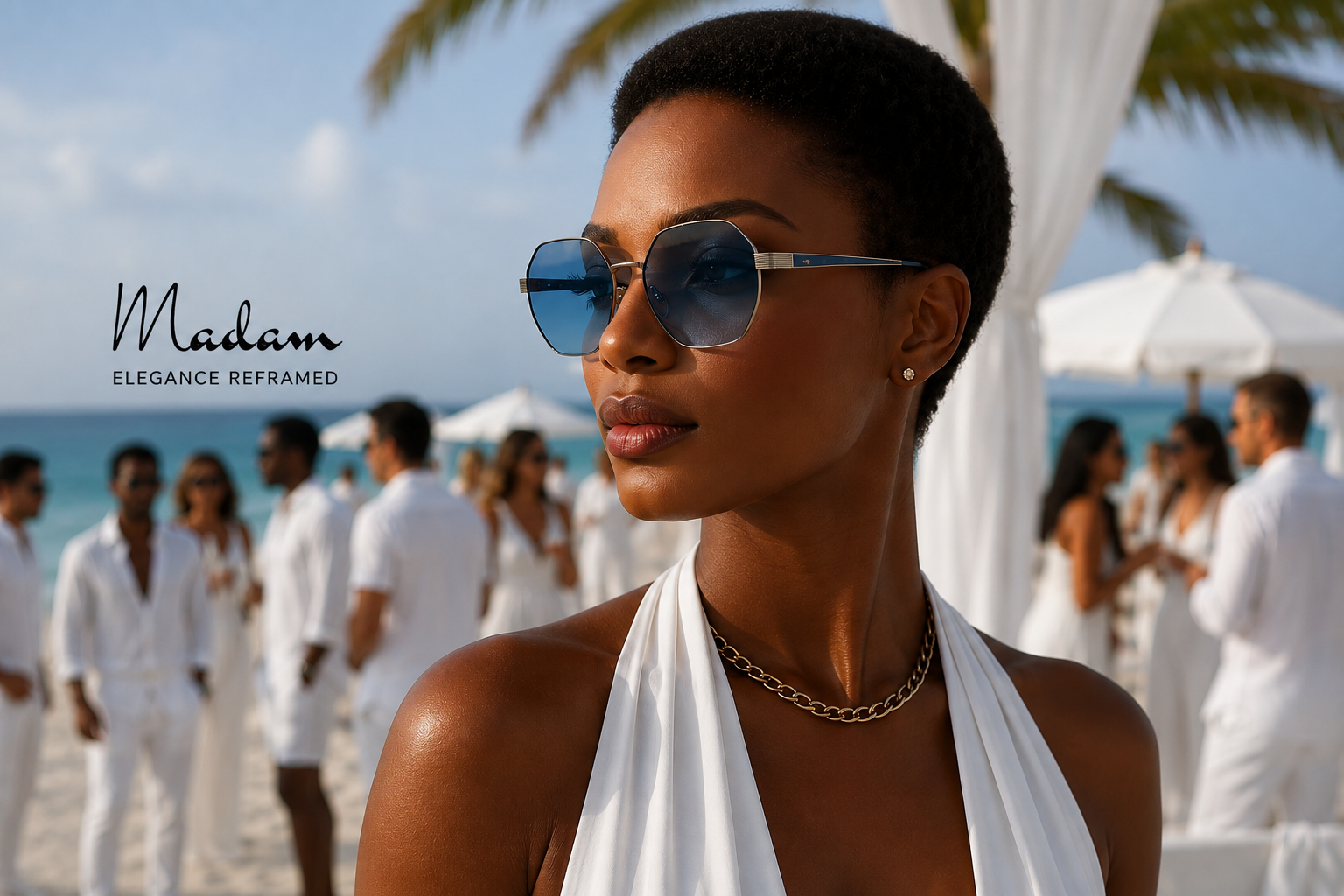 A woman on a beach wearing large square sunglasses with blue-tinted lenses and silver metal frames. The background shows a resort setting with people in white clothing, palm trees, and ocean water.