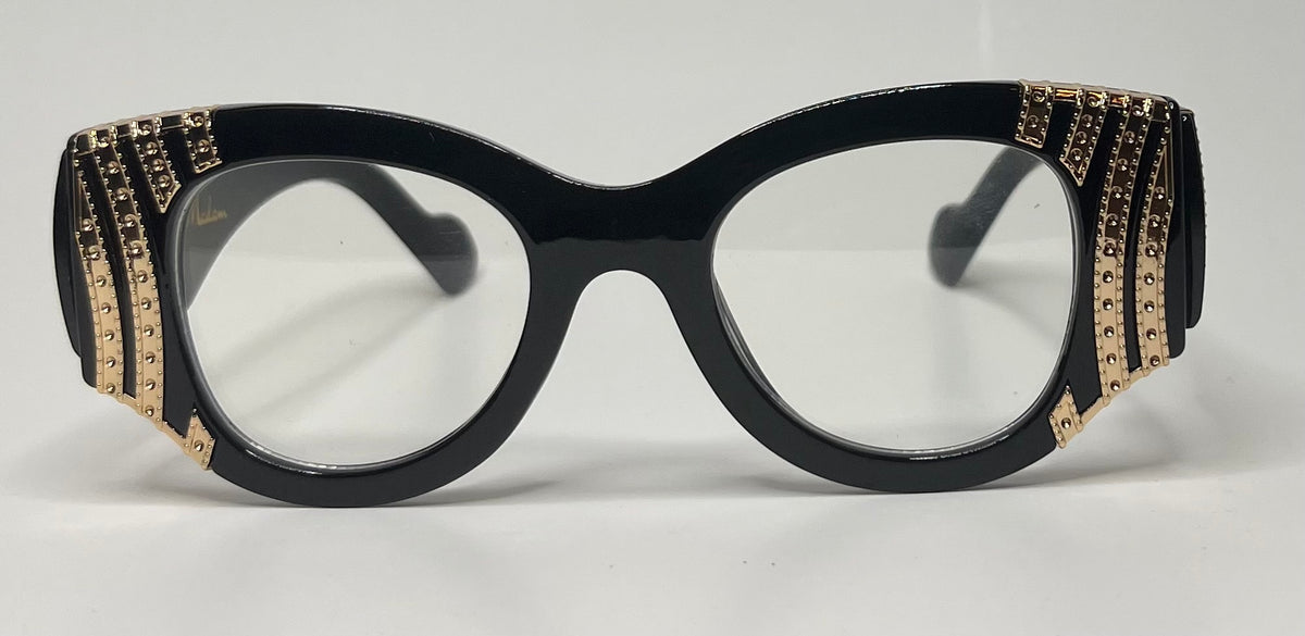 Black cat-eye glasses with gold embellishments on a white background