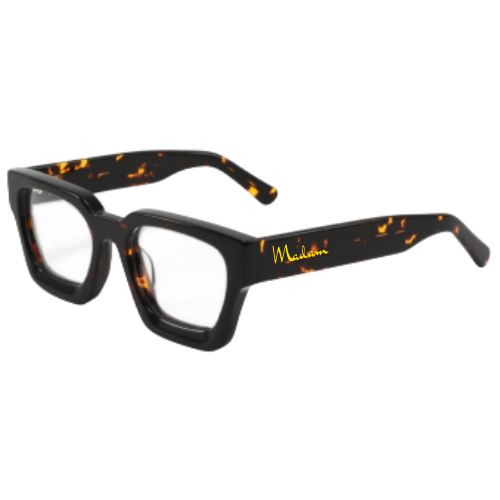 Black and orange tortoiseshell glasses with 'Mada' branding on a white background